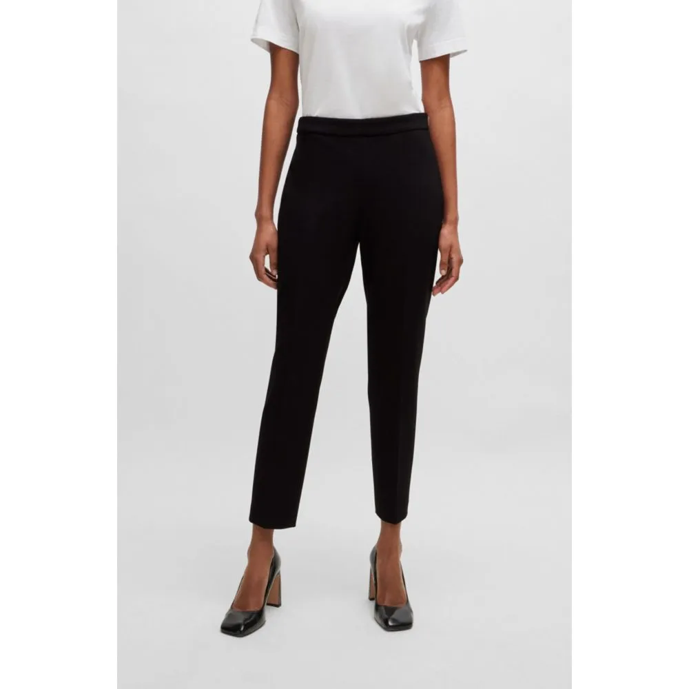 Regular-fit trousers in stretch fabric with tapered leg